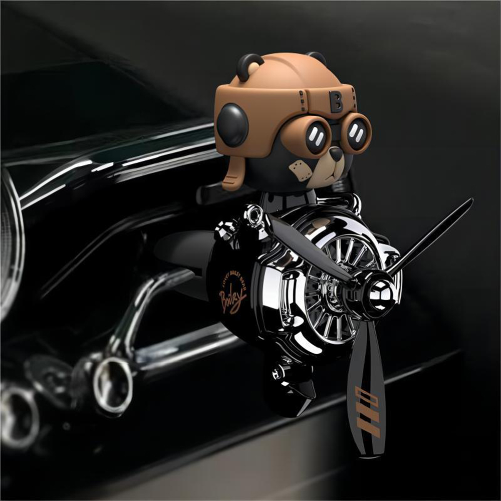 Car air freshener: small airplane and black bear with a bobbing head, designed for the air vent
